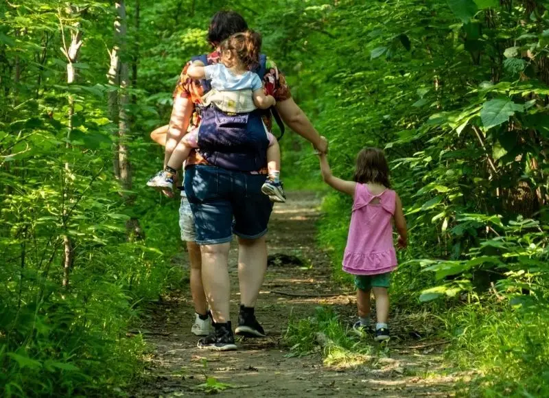 Family walking a trail